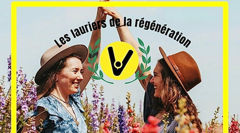 Two young girls, dressed in dresses, are holding hands and smiling at each other. They are standing in a very colorful flower field. At the center of the photo is the logo of The Laurels of Regeneration, featuring laurel leaves.